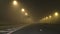 Driving on foggy motorway at night