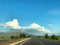Driving highway on blue sky background