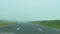 Driving on a highway in thick fog