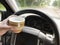 Driving with milk cup