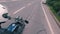 Driving a motorcycle speed limit. White helmet of professional biker in motion.
