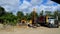 Driving next to truck trucks industrial vehicles Tulum jungle Mexico