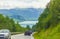 Driving through Norway in summer view of mountains and fjord