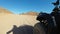 Driving of the Quad Bike in the Desert of Egypt. Extreme view of the wheel off-road vehicle