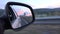 Driving by Rearview Mirror at Sunset, Road Traffic, Pov Tracking Car on Highway, Auto Window View