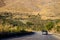 Driving on road through arid sicilian landscape