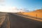 Driving on the road at sunset, Oceano dunes, California