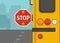 Driving rules and tips. Back view of school bus with an extended stop sign. Close-up view.