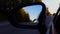 Driving Rural Road View of Side Mirror in Daytime.  Driver Point of View POV Looking Down Side View Mirror Along Countryside