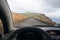 Driving on a scenic coastal road - point of view