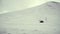 Driving snowmobile through the arctic winter landscape in Svalbard.