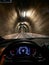 Driving thru a narrow tunnel seen from driver perspective