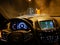 Driving thru the narrow tunnel between the Switzerland and Italy in Alps - seen from a driver dashboard perspective