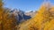 Driving to Gavia mountain pass in Italy. Amazing view of the wood and meadows during fall time. Warm colors. General fall contest