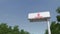 Driving towards advertising billboard with Emirates Airline logo. Editorial 3D rendering 4K clip