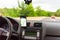 Driving and using waze maps application on smartphone on car dashboard, Driver using Waze maps app in Bucharest, Romania, 2021