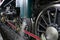 Driving wheels and coupling rods on a steam locomotive made in Japan