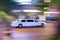 Driving white stretch limousine