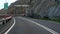 Driving winding A55 coastal cliff road in North Wales