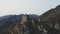 drohne Flying over the great wall at mist smog sky. Aerial view of China great wall Amazing