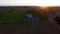 Drone aerial through amish countryside at Sunset