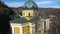 Drone aerial circular view of the Fojnica church tower in Franciscan monastery,