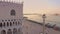 Drone aerial flying over San Marco square and The Doge\'s Palace embankment.