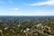 Drone aerial landscape of suburbs looking to Adelaide city