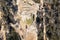 Drone aerial photograph of flood water on a dirt road in a forest