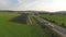 Drone Aerial of a road in countryside fields Europe Germany