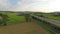 Drone aerial of a road in countryside fields Europe Germany