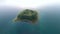 Drone aerial shoot of small island on Ramsko Jezero lake - a tourist destination near Prozor, Bosnia and Herzegovina