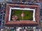 Drone aerial top down view of a building patio with rectangular form