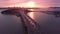 Drone aerial USA 4K Traffic at suspension bridge construction with scenic sun