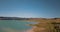 Drone aerial view above camping site on lake shore