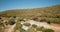 Drone aerial view above camping site on lake shore