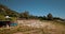 Drone aerial view above camping site on lake shore