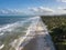 Drone aerial view deserted beach with coconut trees. IlhÃ©us Bahia Brazil