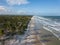 Drone aerial view deserted beach with coconut trees. IlhÃ©us Bahia Brazil