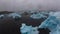 Drone aerial view of Icebergs in Jokulsarlon glacial lagoon in Iceland.