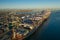 Drone, aerial view of massive container, cargo ships docked at Long Beach port in California USA