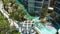 Drone Aerial View of Modern Condominium Apartment Complex with Tropical Garden