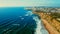 Drone aerial view over beaches, coastlines in Ericeira, Portugal, on summer sunny day. Aerial view to the Beautiful European