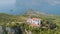 Drone aerial view of the Sanctuary of the Madonna della Ceriola on the top of the Monte Isola island