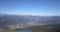 Drone aerial view to the Seriana valley and Orobie Alps in a clear and blue day