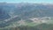 Drone aerial view to the Seriana valley and Orobie Alps in a clear and blue day. Landscape from Pizzo Formico Mountain