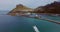 Drone, boat and sea by mountains for holiday, vacation and landscape background of nature and blue water in Cape Town