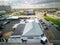 Drone of a building in Asbury Park Beach Boardwalk street New Jersey with parked cars