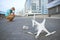 Drone crash. Fallen damaged quadrocopter in city