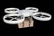 Drone is delivering carton box package isolated on black